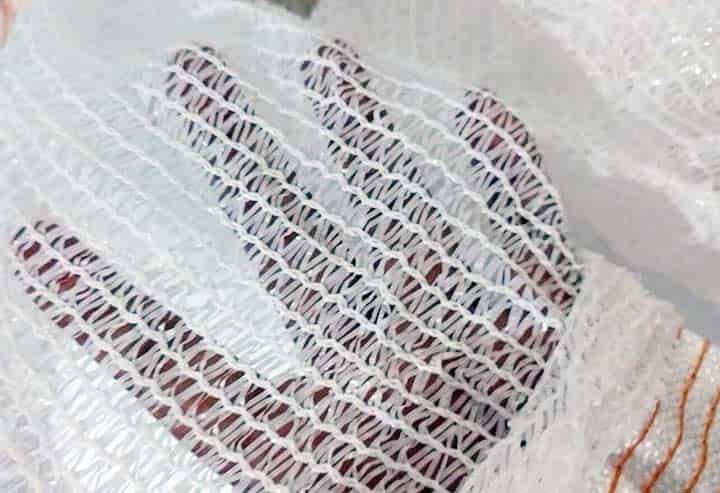 Close-up of a white fabric with a textured pattern