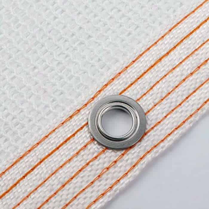 Metallic bearing on a white fabric background with orange lines